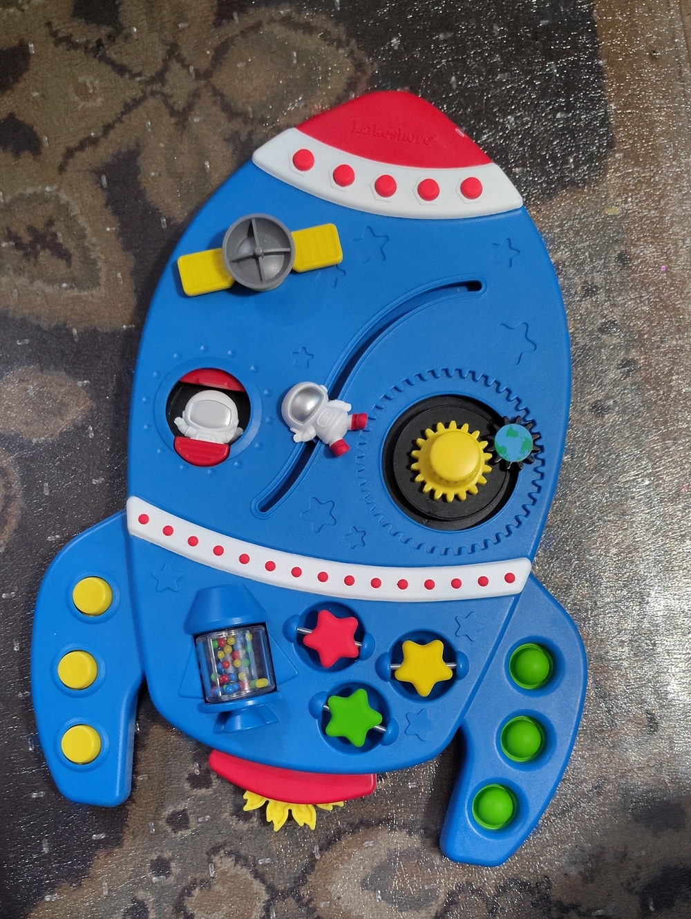 Busy Board Blue Rocket Sensory Activity Toy for Kids - Brand: Lakeshore $65